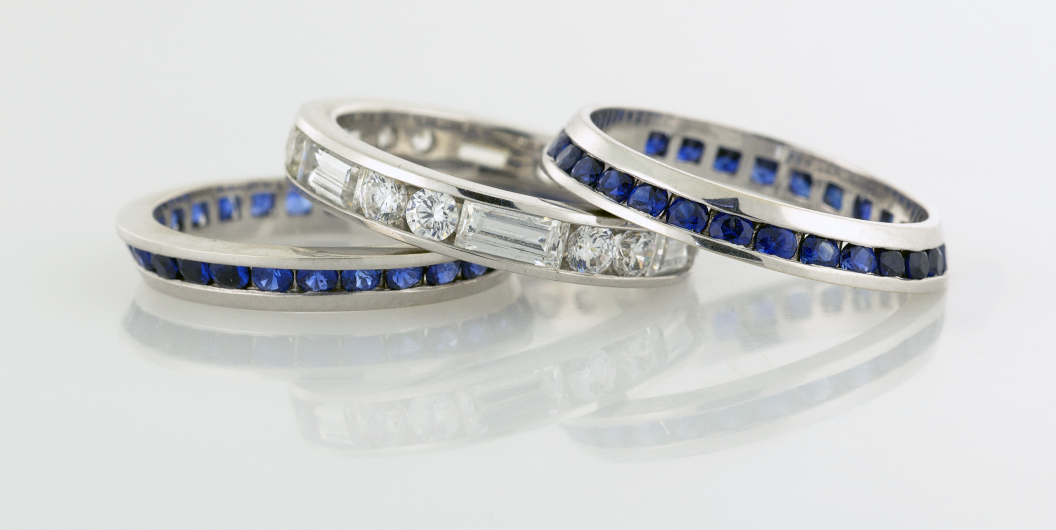 Diamond Baguette and Round Eternity Band with Two Beveled Sapphire